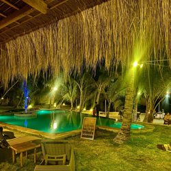 U.Story Guesthouse - Pool view at night
