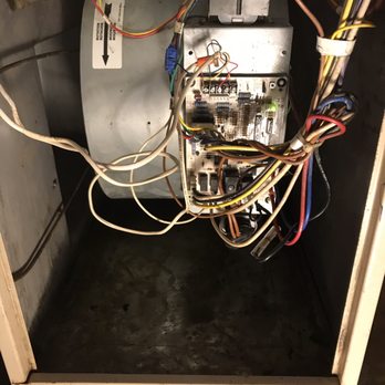 ML Construction - a gas furnace and a water heater - Heating & Air Conditioning/HVAC Near Me - Chicago, Illinois ML Construction - a gas furnace and a water heater - Heating & Air Conditioning/HVAC Near Me - Chicago, Illinois