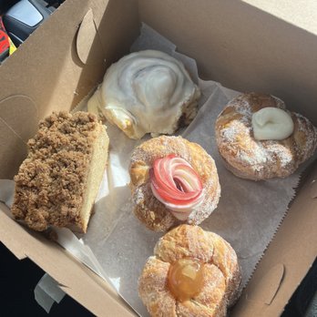 The Pantry KC - Cinnamon crumb cake, cinnamon roll, apple cruffin, raspberry cream cheese cruffin and cream cheese cruffin - Desserts Near Me - Lenexa, Kansas The Pantry KC - Cinnamon crumb cake, cinnamon roll, apple cruffin, raspberry cream cheese cruffin and cream cheese cruffin - Desserts Near Me - Lenexa, Kansas