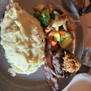 Firebirds Wood Fired Grill - Bacon wrapped filet w/ Parmesan mashed potatoes and vegetables - Seafood Near Me - Annapolis, Maryland Firebirds Wood Fired Grill - Bacon wrapped filet w/ Parmesan mashed potatoes and vegetables - Seafood Near Me - Annapolis, Maryland