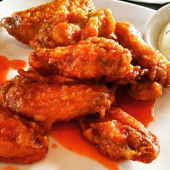 Indochine Kitchen - Sriracha wings. Come for wings Wednesday! - Asian Fusion Near Me - Vancouver, British Columbia