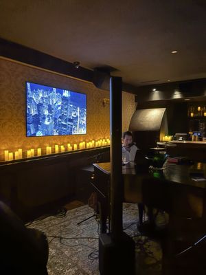 Grapes & Grains Piano Bar Cocktail Lounge by null