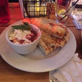 Happy Camper - Cheesy breadsticks with the goat cheese marinara - Pizza Near Me - Chicago, Illinois Happy Camper - Cheesy breadsticks with the goat cheese marinara - Pizza Near Me - Chicago, Illinois