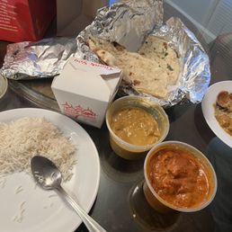 Butter Chicken, Garlic Naan, White Basmati Rice Butter Chicken, Garlic Naan, White Basmati Rice