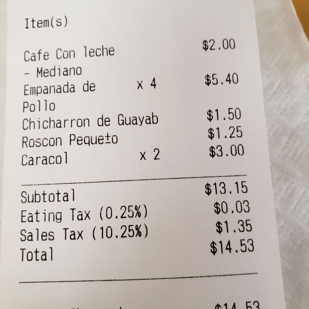 Four chicken empanadas are only $5.40 -- if you spend $5 and above you can use your debit or credit card.