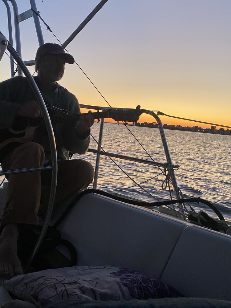 Poet's Lounge Sailing Charters Logo