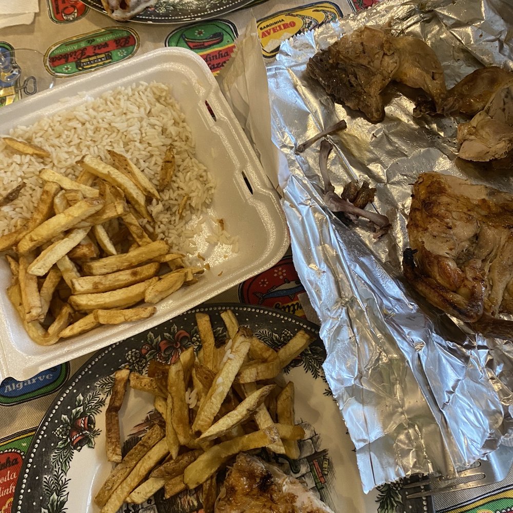 Bifana sandwich and a whole grilled rotisserie chicken with fries and rice!