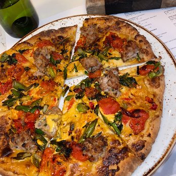 Sixty Vines - GF/VG Broccolini and Potato pizza but subbed the potatoes for sausage. Cauliflower crust was so delicious!! - Wine Bars Near Me - Winter Park, Florida Sixty Vines - GF/VG Broccolini and Potato pizza but subbed the potatoes for sausage. Cauliflower crust was so delicious!! - Wine Bars Near Me - Winter Park, Florida