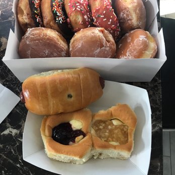 Grand Donuts - A little bit of everything. We might have gotten too much - Donuts Near Me - Leander, Texas Grand Donuts - A little bit of everything. We might have gotten too much - Donuts Near Me - Leander, Texas
