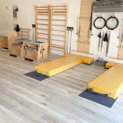 Gazelle Pilates - Customized Balanced Body Spring Boards  with elevated Wall Unit Mat. Wunda Chairs, Ladder Barrel and Classic Swedish bars.
