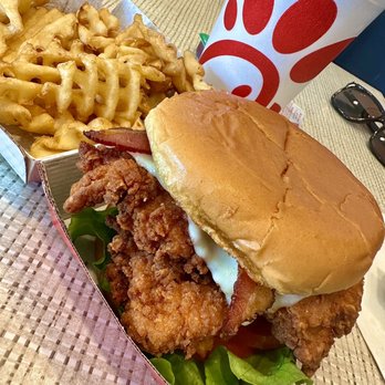 Chick-fil-A - Spicy Deluxe Sandwich with extra chicken patty and bacon added. Lemonade and waffle fries - Fast Food Near Me - Upland, California Chick-fil-A - Spicy Deluxe Sandwich with extra chicken patty and bacon added. Lemonade and waffle fries - Fast Food Near Me - Upland, California