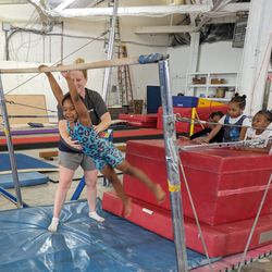 Philadelphia Boys’ Gymnastics - Swinging on uneven parallel bars
