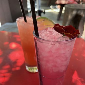 Resident - two cocktails on a red table - Cocktail Bars Near Me - Los Angeles, California Resident - two cocktails on a red table - Cocktail Bars Near Me - Los Angeles, California