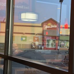Picture of Del taco from inside Popeyes where I'm eating supper due to their not being able to wait on me Picture of Del taco from inside Popeyes where I'm eating supper due to their not being able to wait on me
