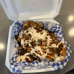 Tacomiendo - Party fries with chorizo