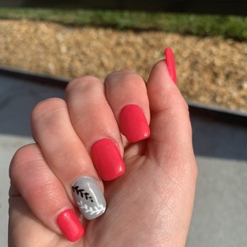 S&S Nails Spa - The pink looks red in this photo but it is actually a hot neon pink. I asked for some simple leaf/plant design and I absolutely love it! - Nail Salons Near Me - Venice, Florida