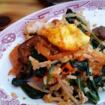 Short Round - Not a great photo, I know, but please see that yellow spot on top is EGG YOLK. Note it is not runny. - Vietnamese Near Me - Portland, Oregon Short Round - Not a great photo, I know, but please see that yellow spot on top is EGG YOLK. Note it is not runny. - Vietnamese Near Me - Portland, Oregon