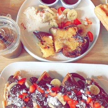 Mess Waffles, Etc. - Orange Juice - Carafe, Original French Toast, Nutella Waffle with Strawberries & Bananas - Breakfast & Brunch Near Me - College Station, Texas Mess Waffles, Etc. - Orange Juice - Carafe, Original French Toast, Nutella Waffle with Strawberries & Bananas - Breakfast & Brunch Near Me - College Station, Texas