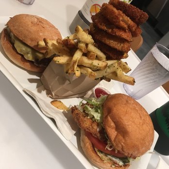 Burger Lounge - Left- lounge burger medium Middle- 1/2 onion rings 1/2 fries  Right-crispy chicken sandwich (this was bomb) - Burgers Near Me - Campbell, California