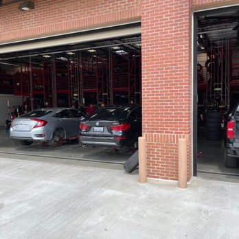 Discount Tire - Inside installation area and warehouse for inventory. - Tires Near Me - Matthews, North Carolina