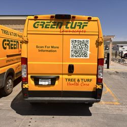 Green Turf Lawnscapes - Our signature bright yellow vans.