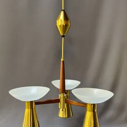 Panache Lighting - Mid-century chandelier rewired and new sockets added to preserve its original style while bringing it up to modern electrical standards.