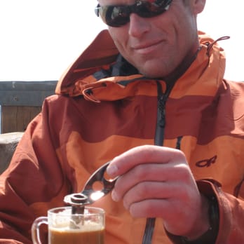 Pro Ski & Mountain Service - After a long day guiding on the Ortler Traverse Martin Volken enjoys his coffee in an Italian hut - Outdoor Gear Near Me - North Bend, Washington Pro Ski & Mountain Service - After a long day guiding on the Ortler Traverse Martin Volken enjoys his coffee in an Italian hut - Outdoor Gear Near Me - North Bend, Washington