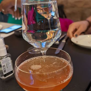 Mercantile - Amaretto Sour with splash of cranberry juice - New American Near Me - Denver, Colorado