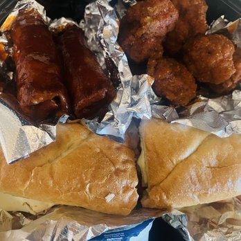 Macy’s Place Pizzeria - "Stoner Box" special 1/2 sub, saucy pizza logs, boneless wings - Pizza Near Me - Clarence, New York Macy’s Place Pizzeria - "Stoner Box" special 1/2 sub, saucy pizza logs, boneless wings - Pizza Near Me - Clarence, New York