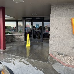 Exterior outside entrance of Denny's - Soapy water as we walked out - Hayward, California Exterior outside entrance of Denny's - Soapy water as we walked out - Hayward, California
