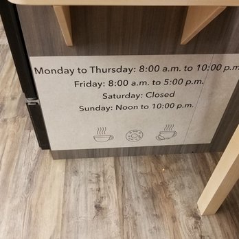 Cafe Verso - Hours posted just inside the door by the microwave and toaster. - Coffee & Tea Near Me - Eugene, Oregon