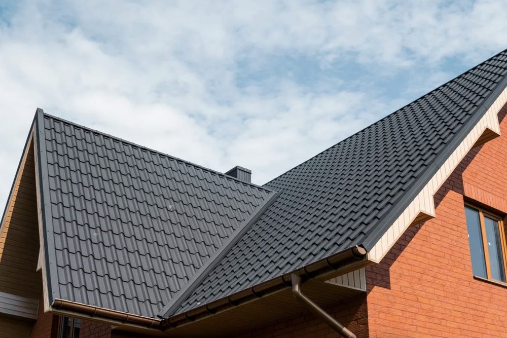 Slide of Harry's Roofing and Construction