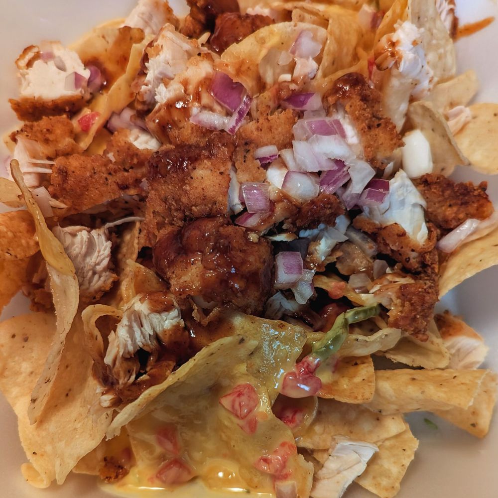 Pluckers Wing Bar - South Lamar - Plucker's Nachos No Cilantro - Chicken Wings Near Me - Austin, Texas Pluckers Wing Bar - South Lamar - Plucker's Nachos No Cilantro - Chicken Wings Near Me - Austin, Texas