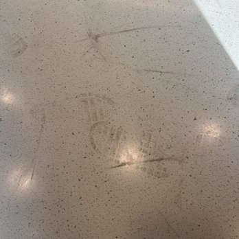 Habit Burger & Grill - Table with child's shoe prints. - Burgers Near Me - Nampa, Idaho