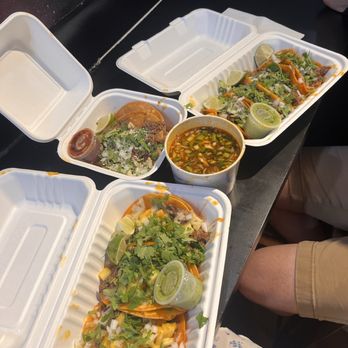 Birria LES - On the left: Al Pastor Tacos with cheese On the right: Beef Tacos with cheese Middle: Tostada and consume - Tacos Near Me - New York, New York Birria LES - On the left: Al Pastor Tacos with cheese On the right: Beef Tacos with cheese Middle: Tostada and consume - Tacos Near Me - New York, New York
