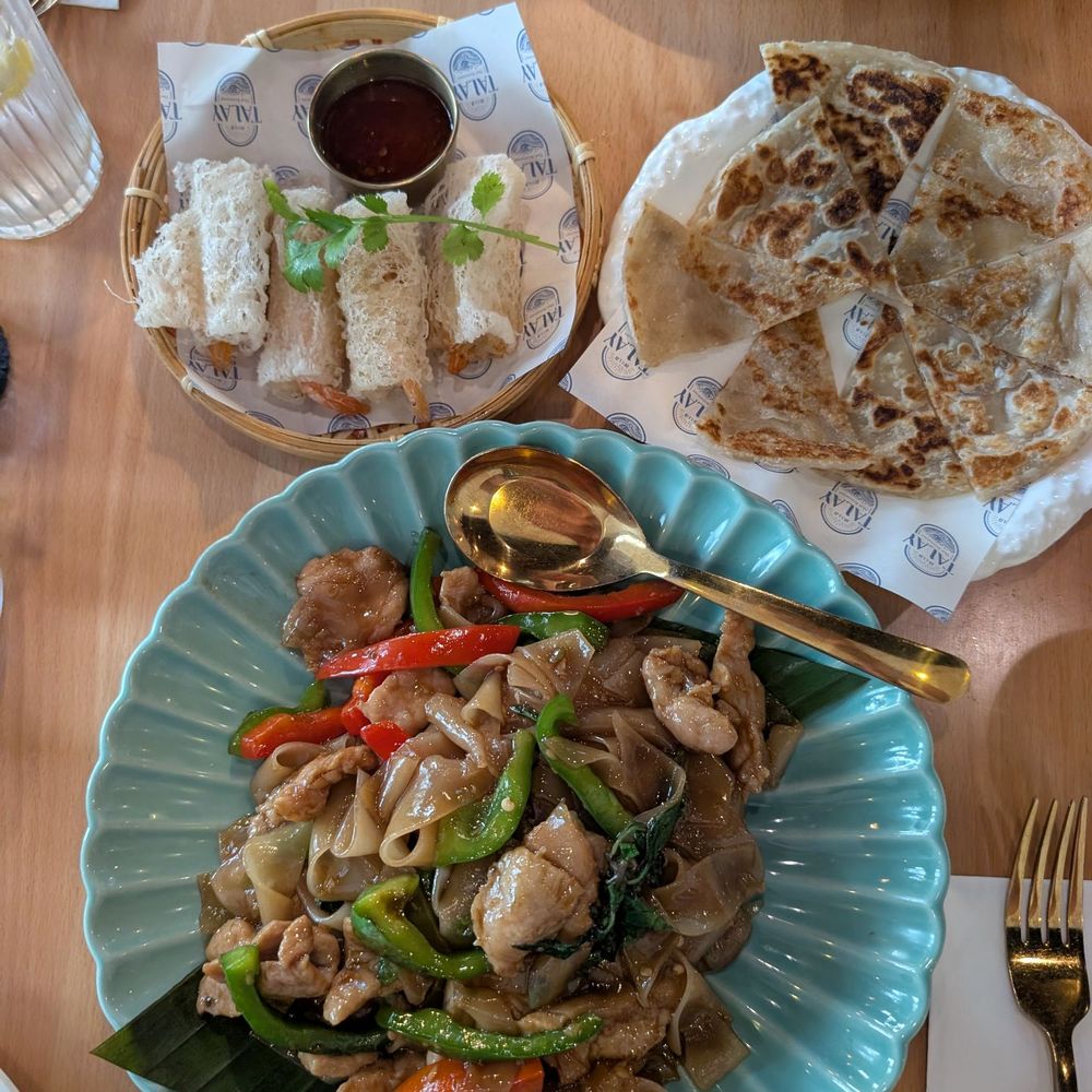 TALAY - Pad Kee Mow with pork $17, shrimp vermicelli rolls $8 and side roti $4 - Thai Near Me - Orlando, Florida TALAY - Pad Kee Mow with pork $17, shrimp vermicelli rolls $8 and side roti $4 - Thai Near Me - Orlando, Florida
