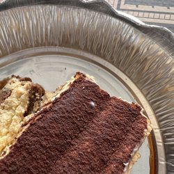 Anthony's Pizza - Absolutely disgusting!! tiramisu had white, fuzzy mold and look close enough the hairs in the pan above.