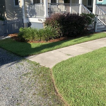 Carolina Environments - the front yard of a house - Landscaping Near Me