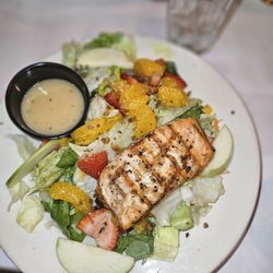 Oscar's - Salmon Salad medium well, pears, mandarin oranges, sliced strawberries with a citrus vinegarette.