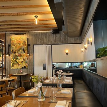 Evelina - a restaurant with a long wooden table - Italian Near Me - Brooklyn, New York