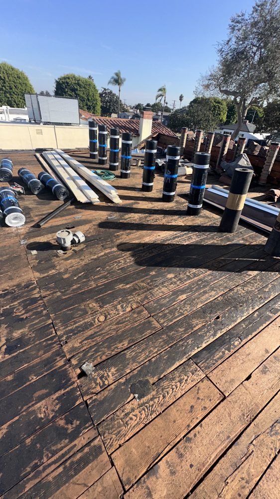 Slide of T’S Roofing