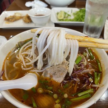 Bep Saigon Asian Kitchen - a bowl of soup and chopsticks - Vietnamese Near Me - Austin, Texas Bep Saigon Asian Kitchen - a bowl of soup and chopsticks - Vietnamese Near Me - Austin, Texas