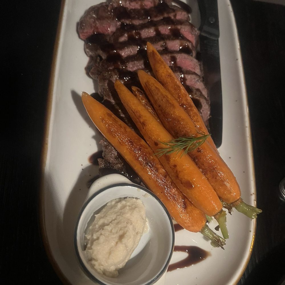 The Botanist - Medium rare steak with a side of horseradish - Cocktail Bars Near Me - Bakersfield, California The Botanist - Medium rare steak with a side of horseradish - Cocktail Bars Near Me - Bakersfield, California