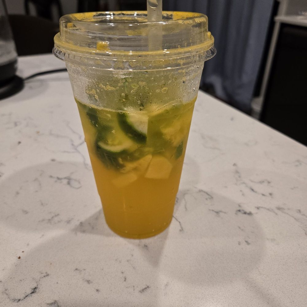 Yummy Bites - My mango mojito, couldn't help but drink almost half in one gulp. - Coffee & Tea Near Me - Minneapolis, Minnesota Yummy Bites - My mango mojito, couldn't help but drink almost half in one gulp. - Coffee & Tea Near Me - Minneapolis, Minnesota