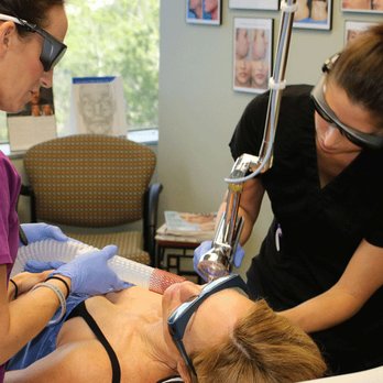 Skinspirations - Kate Dellangelo, APRN, performing a laser skin resurfacing treatment - Tattoo Removal Near Me - Clearwater, Florida Skinspirations - Kate Dellangelo, APRN, performing a laser skin resurfacing treatment - Tattoo Removal Near Me - Clearwater, Florida