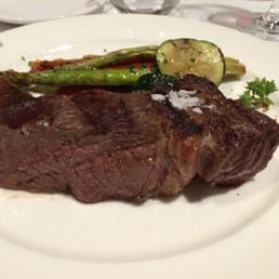 Argentinian rib eye steak with grilled vegetables. This is only half a portion.