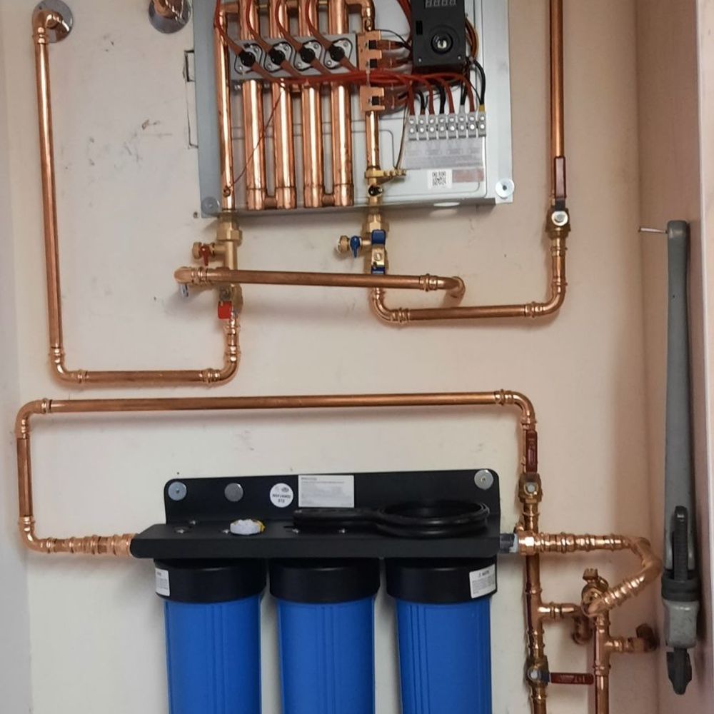 Parker & Sons - Thankless hot water heater and three stage water filter system. - Plumbing Near Me - Phoenix, Arizona Parker & Sons - Thankless hot water heater and three stage water filter system. - Plumbing Near Me - Phoenix, Arizona