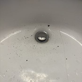 Motel 6 - Black debris (not ashes) in sink basin. - Hotels Near Me - Fontana, California