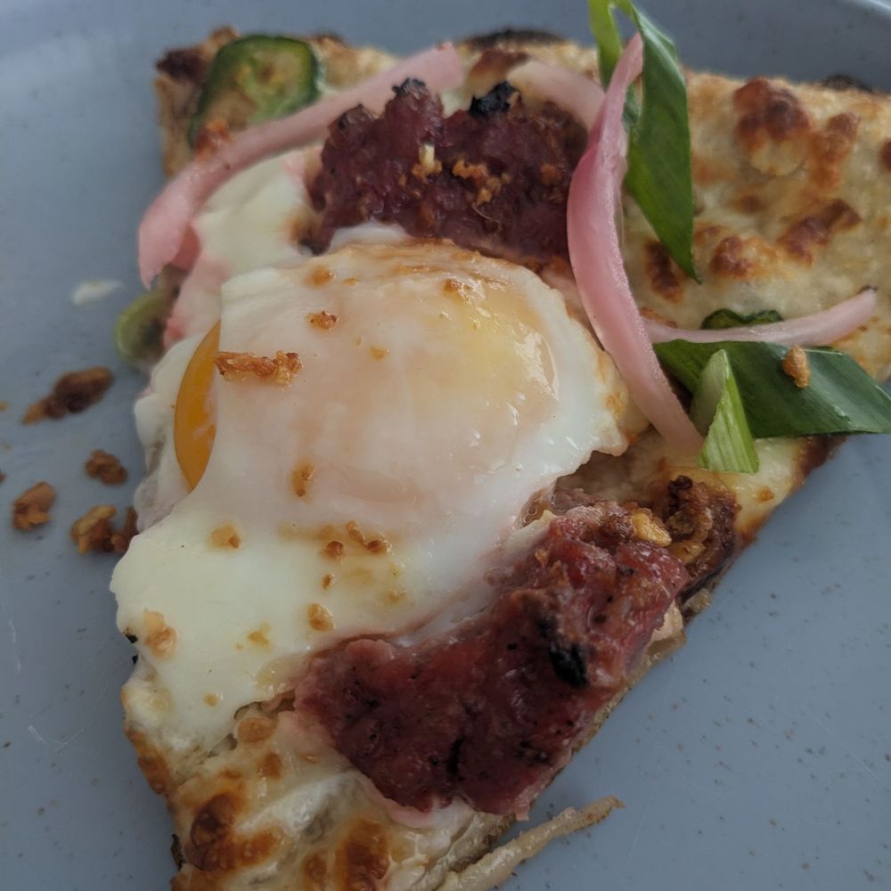 Just Pizza - Slice of Filipino Breakfast Pizza - Pizza Near Me - Vancouver, British Columbia Just Pizza - Slice of Filipino Breakfast Pizza - Pizza Near Me - Vancouver, British Columbia