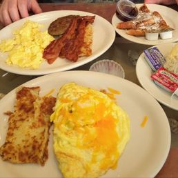 Veggie omelette with hash brown and biscuit Veggie omelette with hash brown and biscuit
